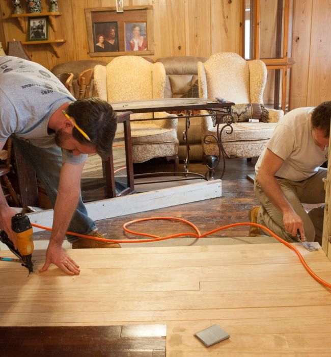 contractors installing flooring